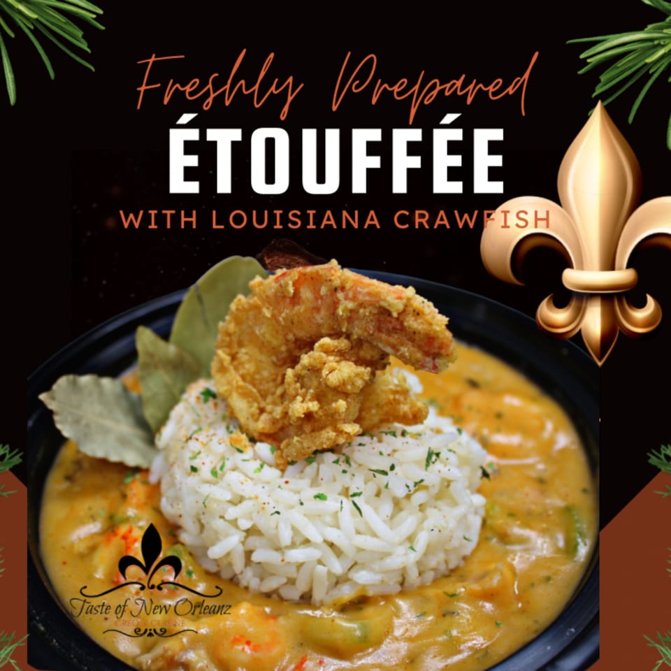 A Taste of New Orleans' crawfish étouffée with rice and fried shrimp, garnished with bay leaves.